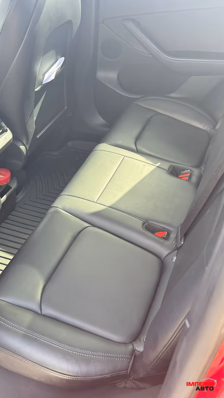 Tesla Model Y - фото 24