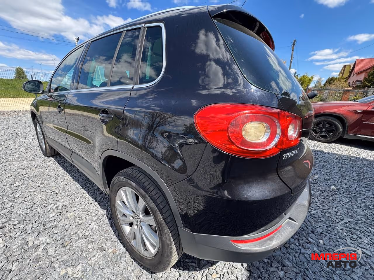 Volkswagen Tiguan - фото 12