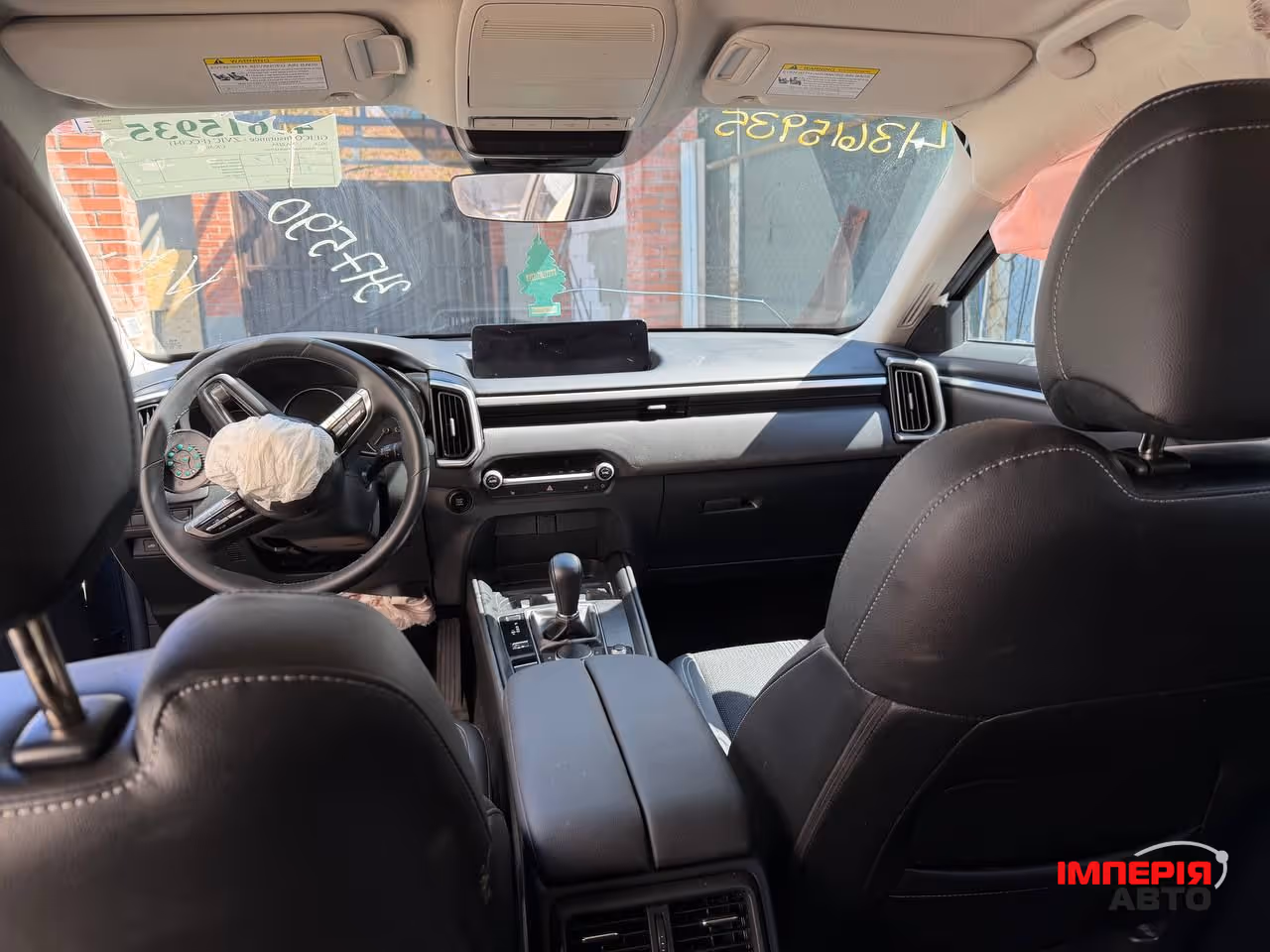 Mazda CX-50 - фото 9
