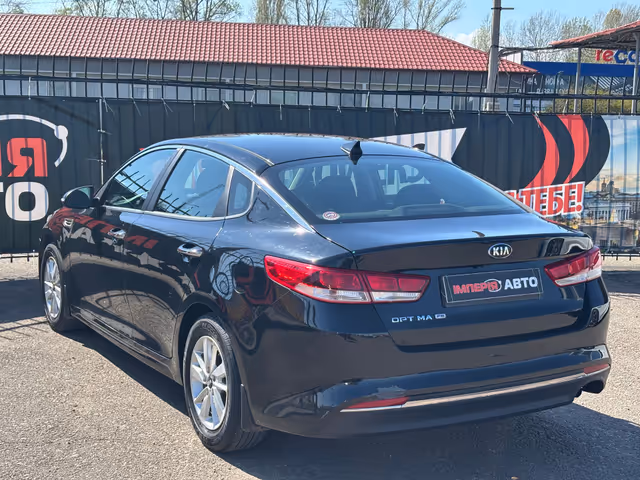 Kia Optima - фото 4