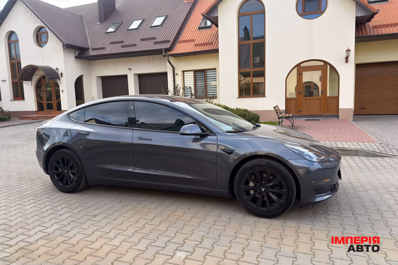 Tesla Model 3 - фото 11