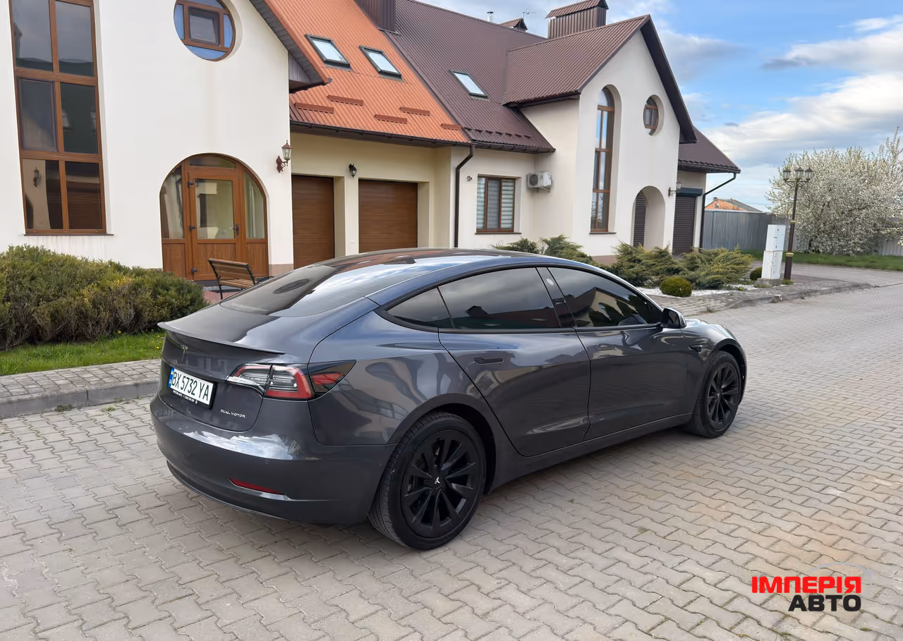 Tesla Model 3 - фото 12
