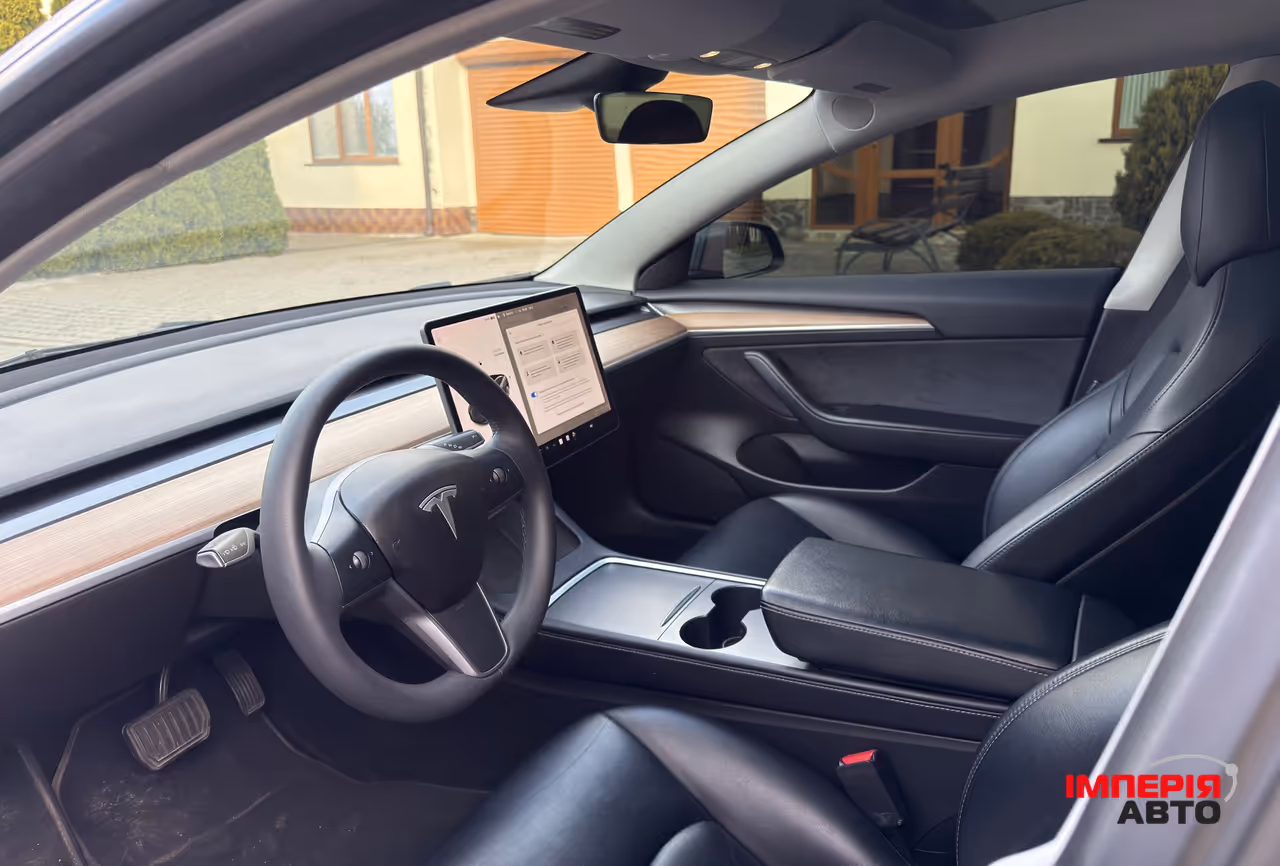 Tesla Model 3 - фото 13