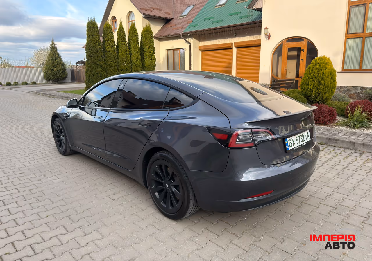 Tesla Model 3 - фото 9