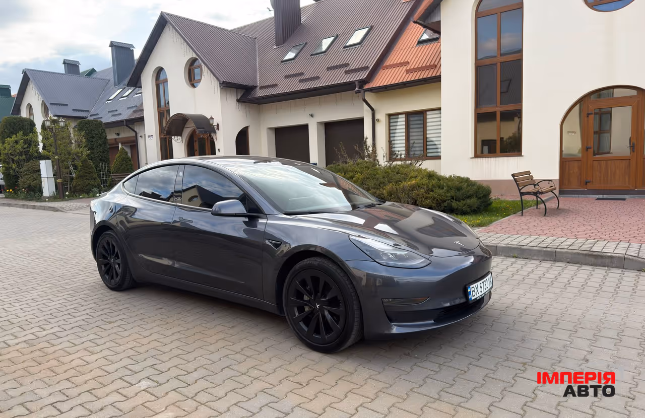 Tesla Model 3 - фото 10