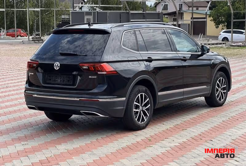 Volkswagen Tiguan - фото 6