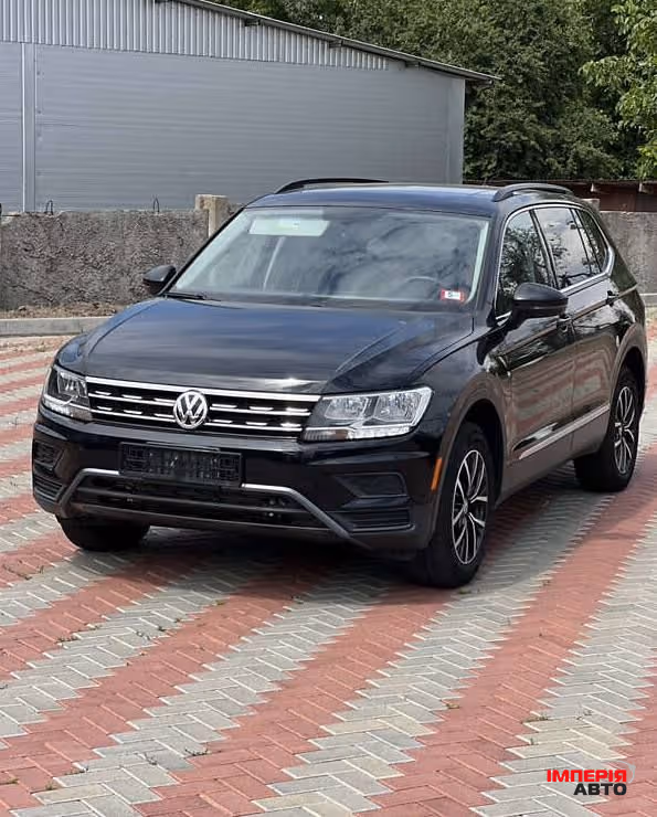 Volkswagen Tiguan - фото 1