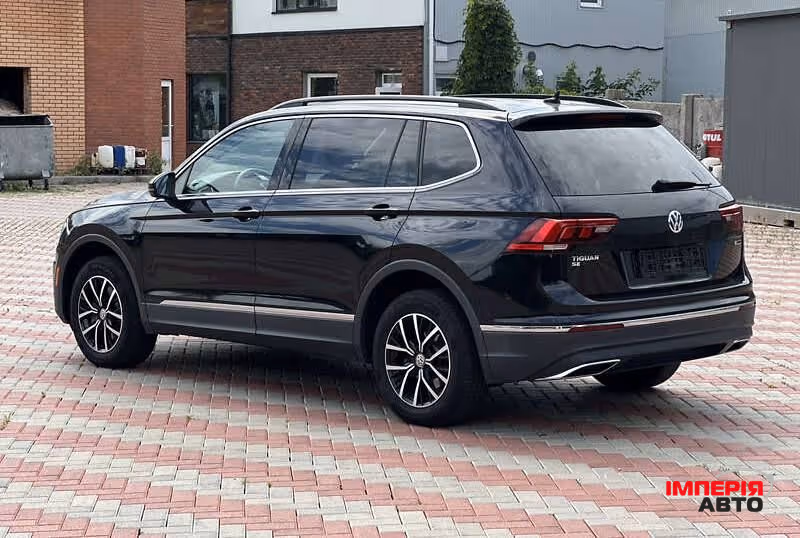Volkswagen Tiguan - фото 8