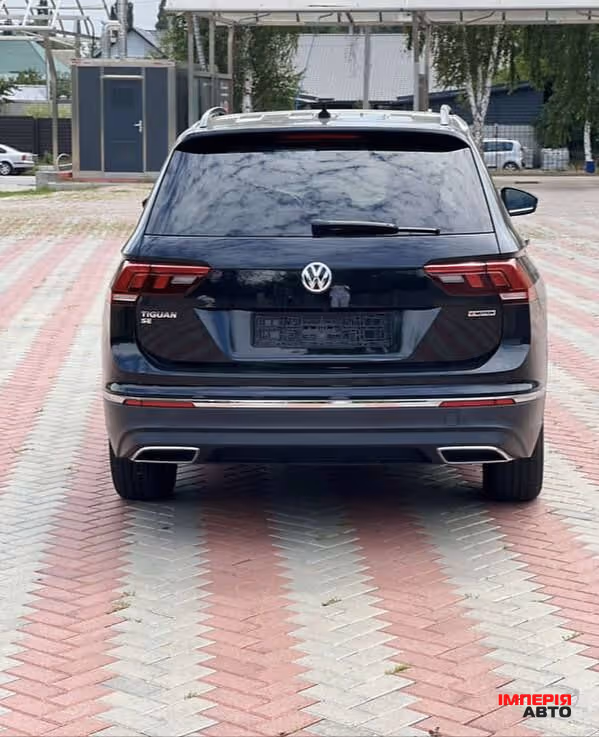 Volkswagen Tiguan - фото 7