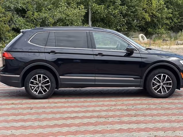 Volkswagen Tiguan - фото 5