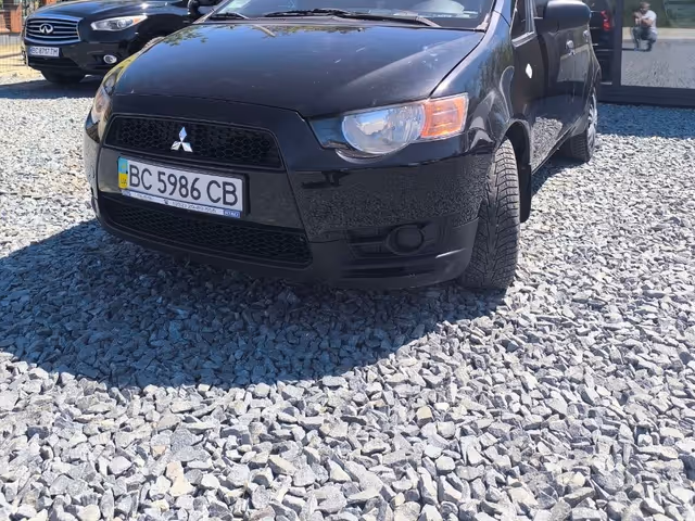 Mitsubishi Colt - фото 1