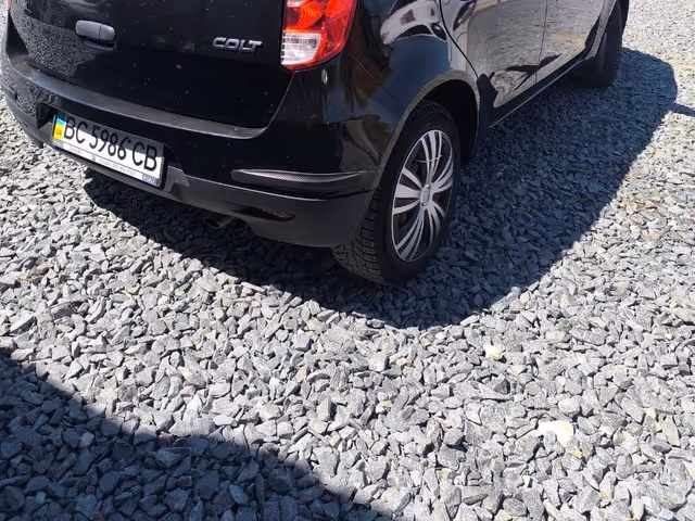 Mitsubishi Colt - фото 5
