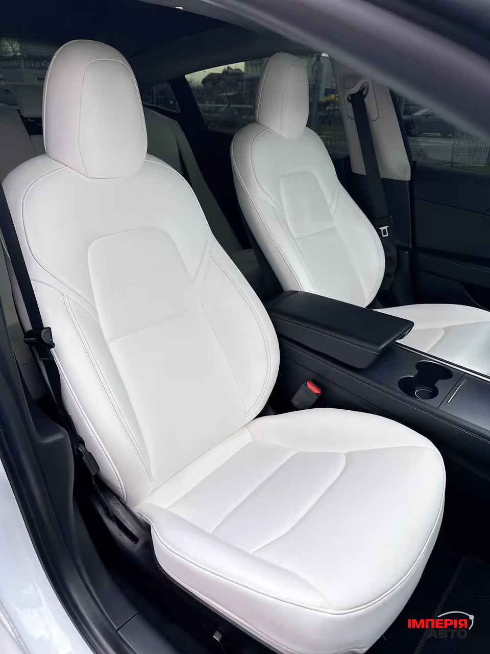 Tesla Model 3 - фото 11