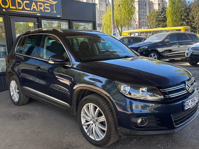 Volkswagen Tiguan - фото 1