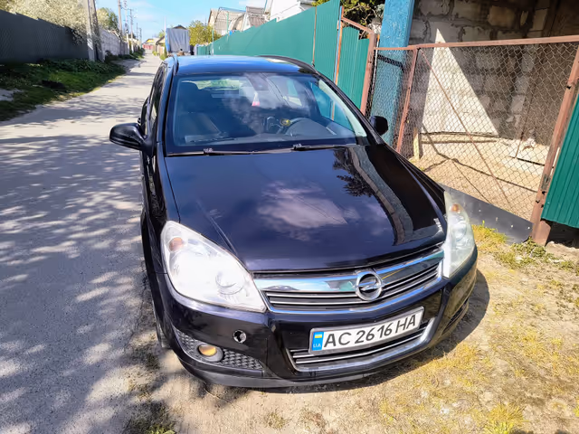 Opel Astra - фото 1