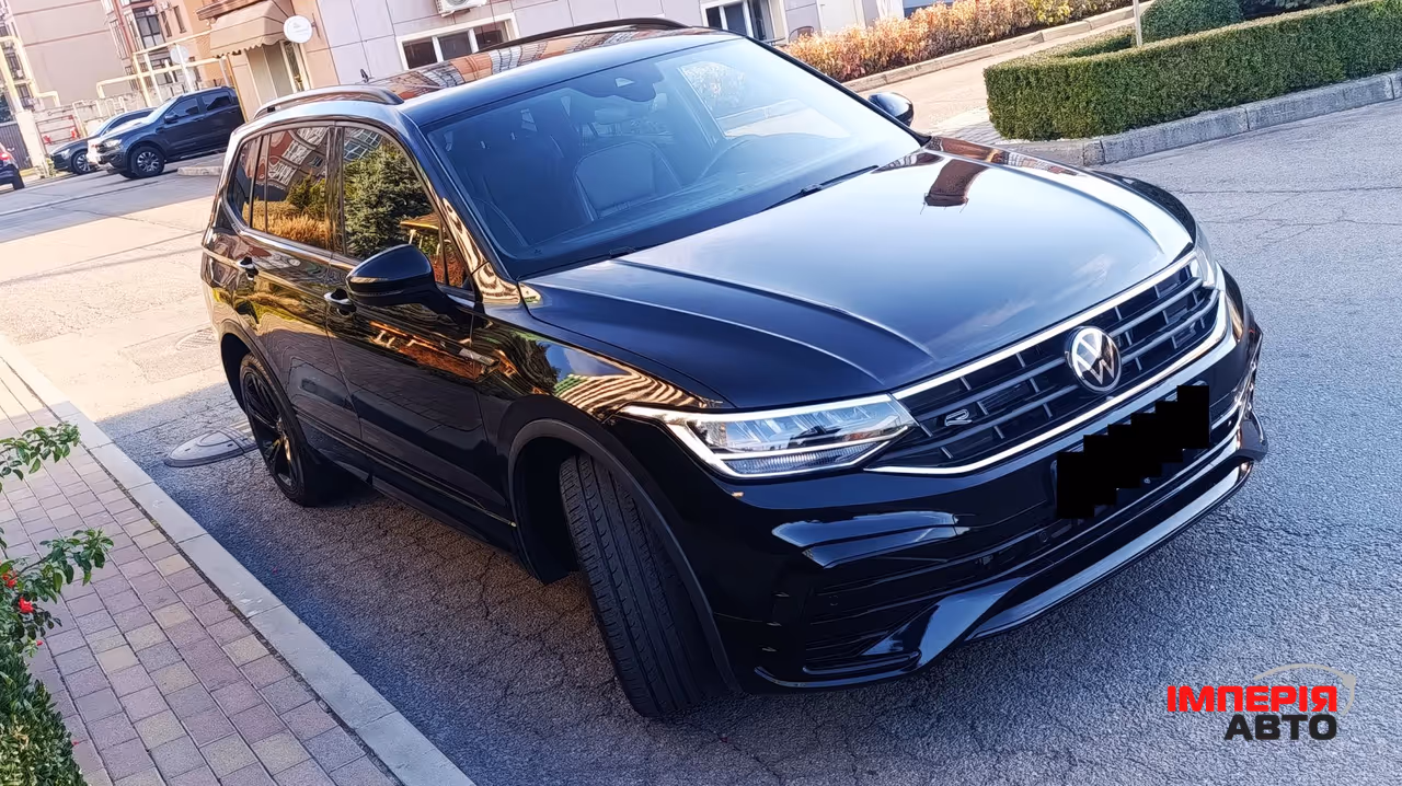 Volkswagen Tiguan - фото 9