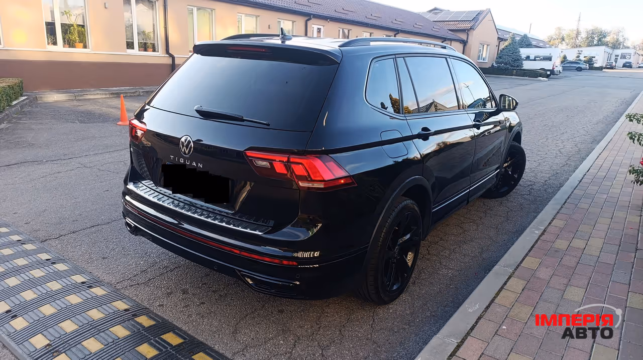 Volkswagen Tiguan - фото 2