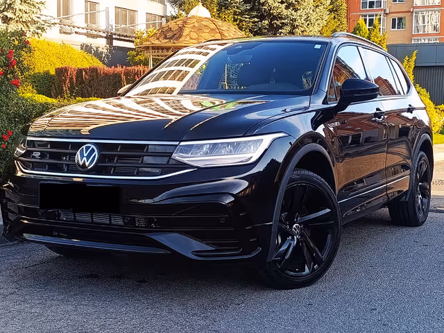 Volkswagen Tiguan - фото 1