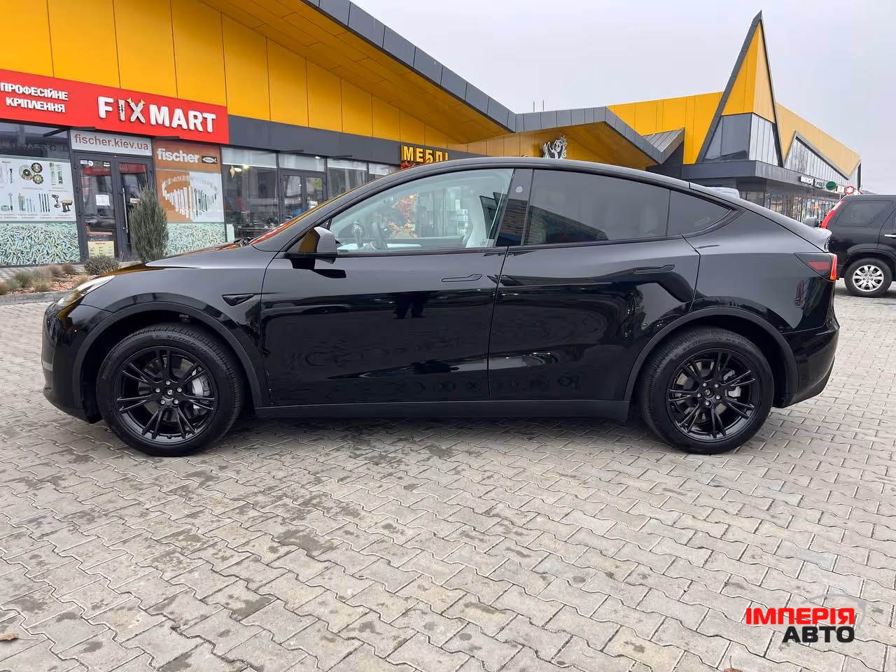 Tesla Model Y - фото 8