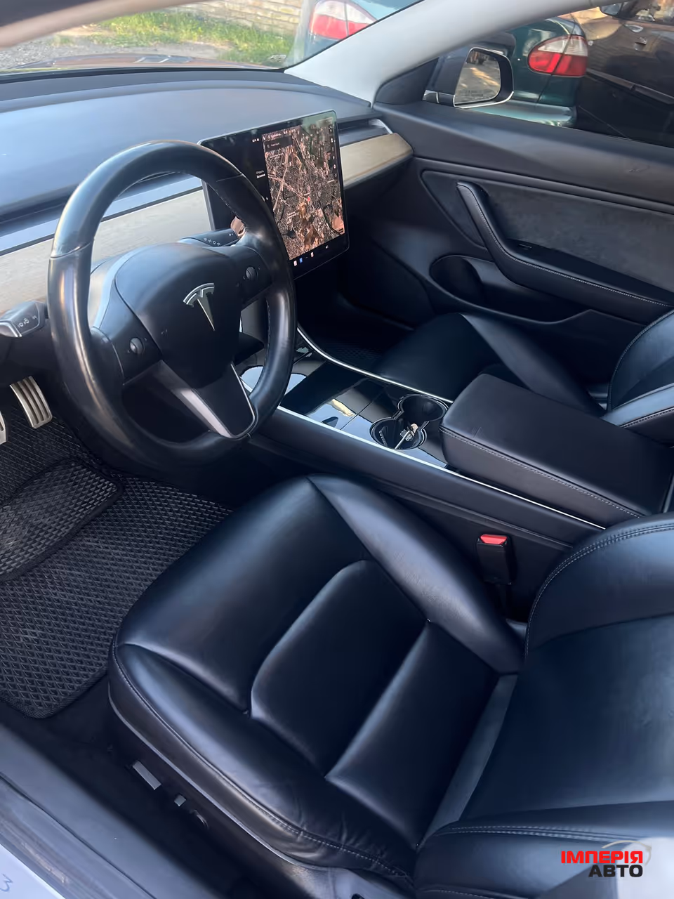 Tesla Model 3 - фото 11