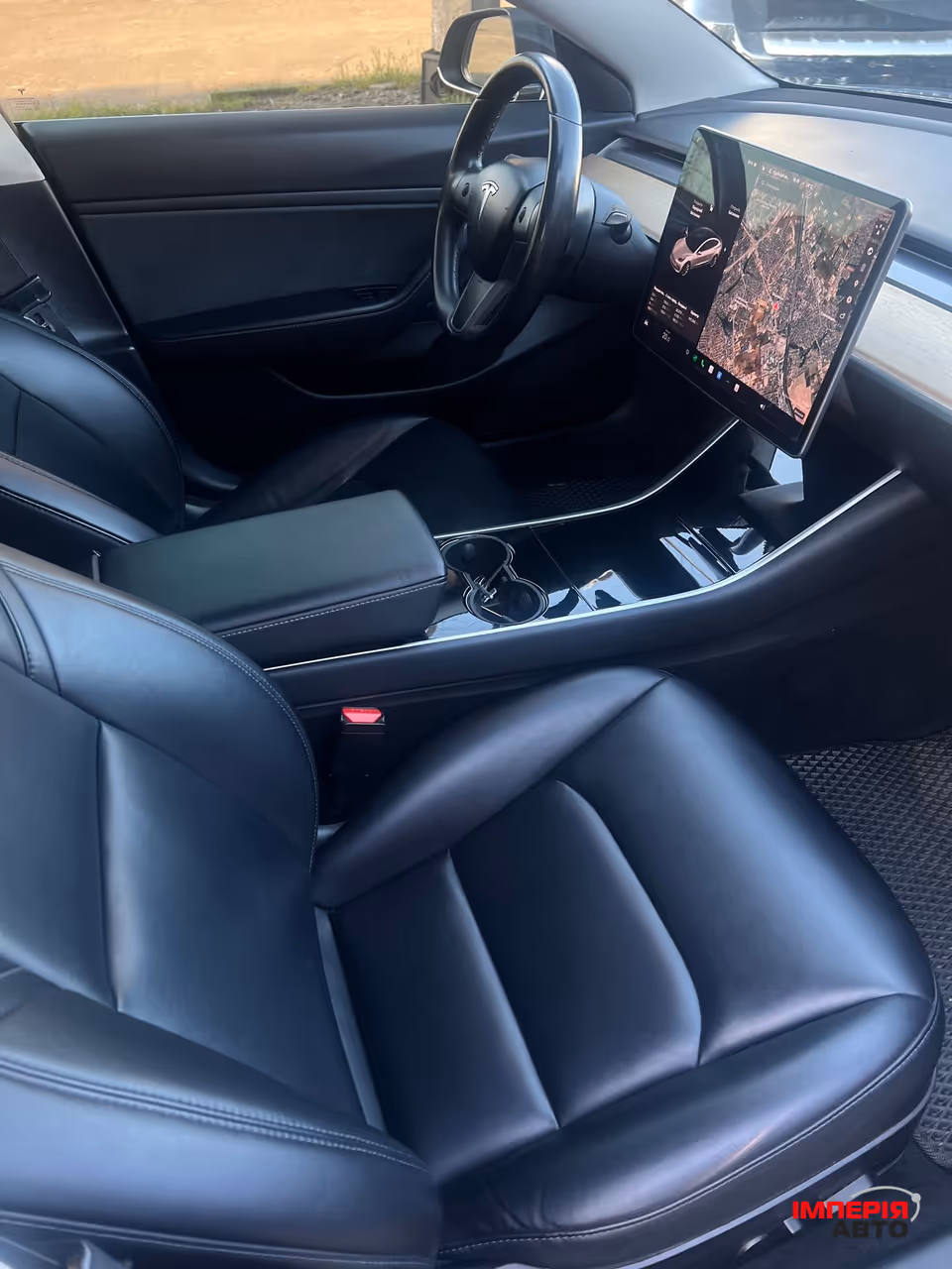 Tesla Model 3 - фото 9