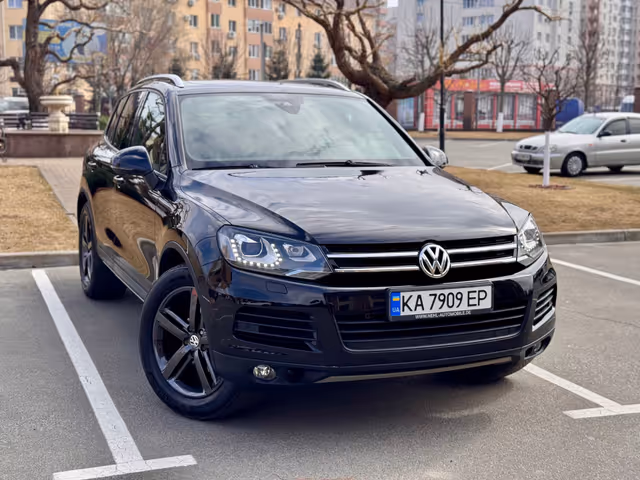 Volkswagen Touareg - фото 1
