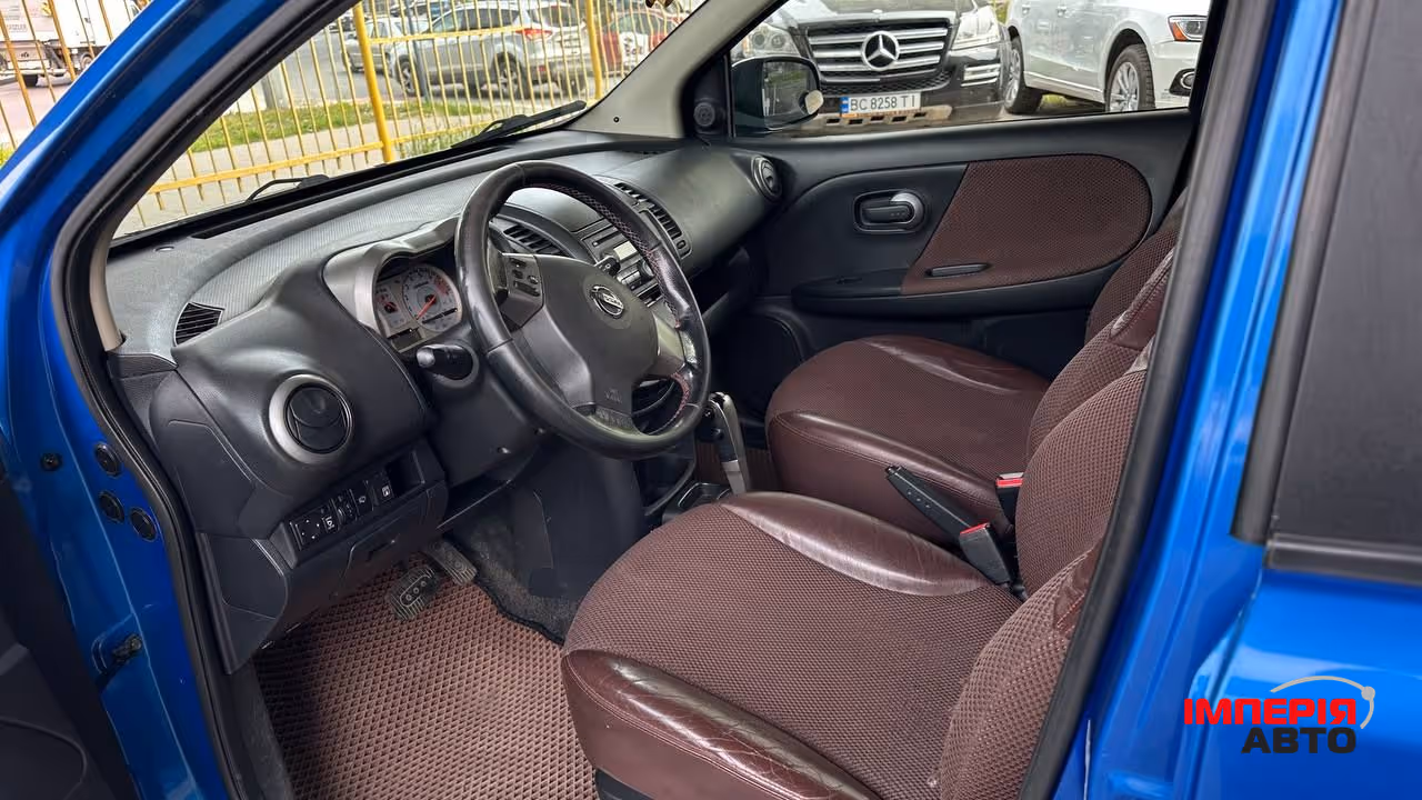 Nissan Note - фото 4