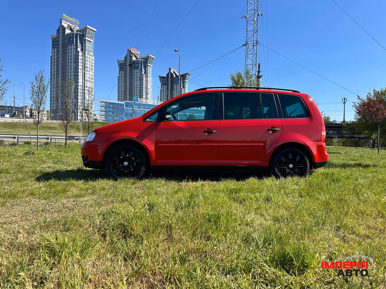 Volkswagen Touran - фото 5