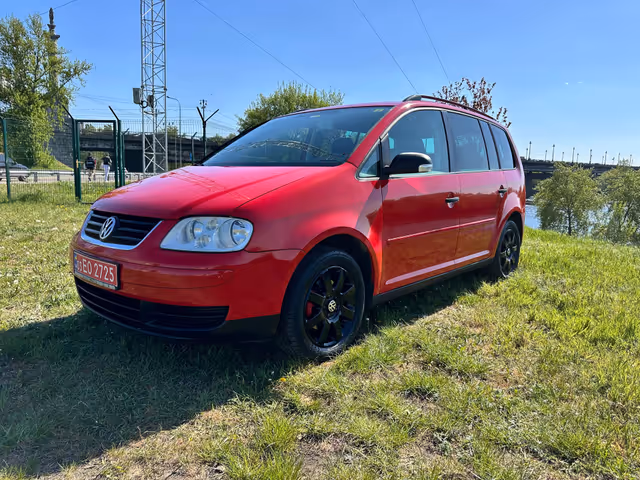 Volkswagen Touran - фото 3