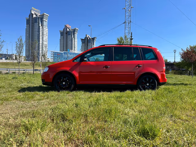 Volkswagen Touran - фото 5