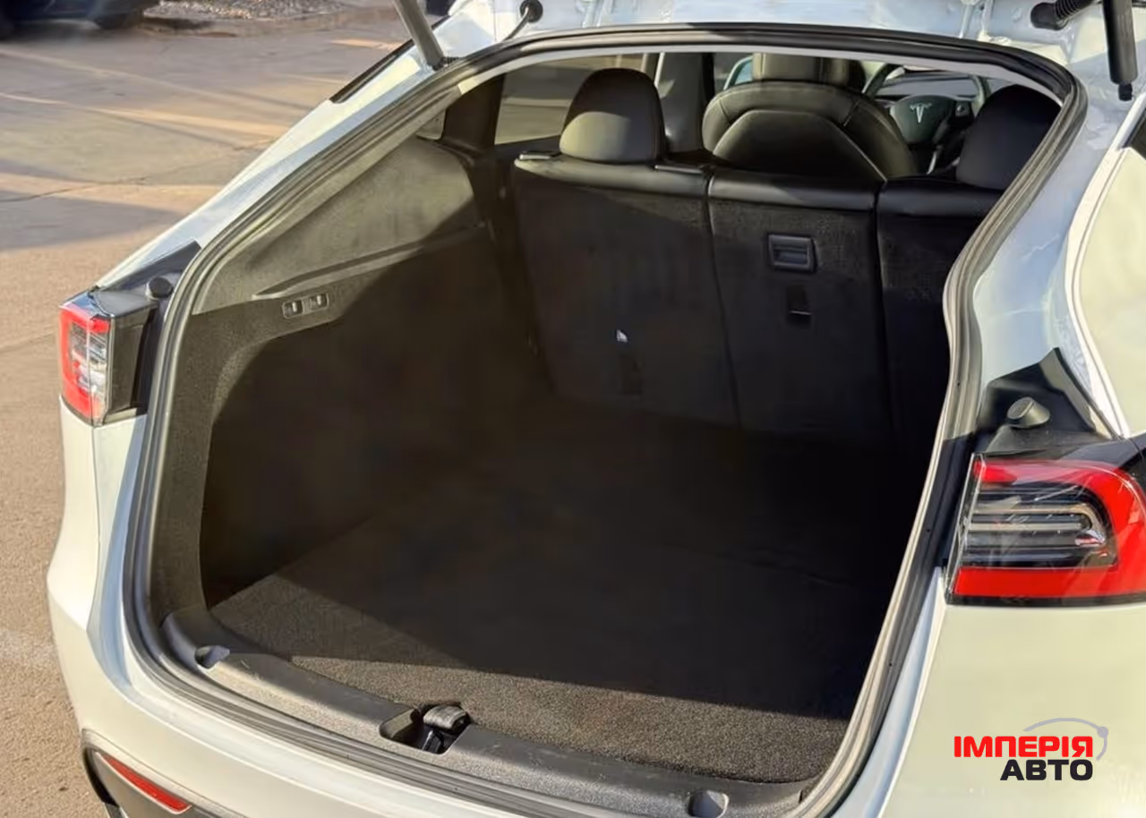 Tesla Model Y - фото 20