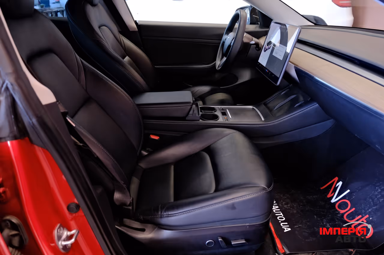 Tesla Model 3 - фото 9