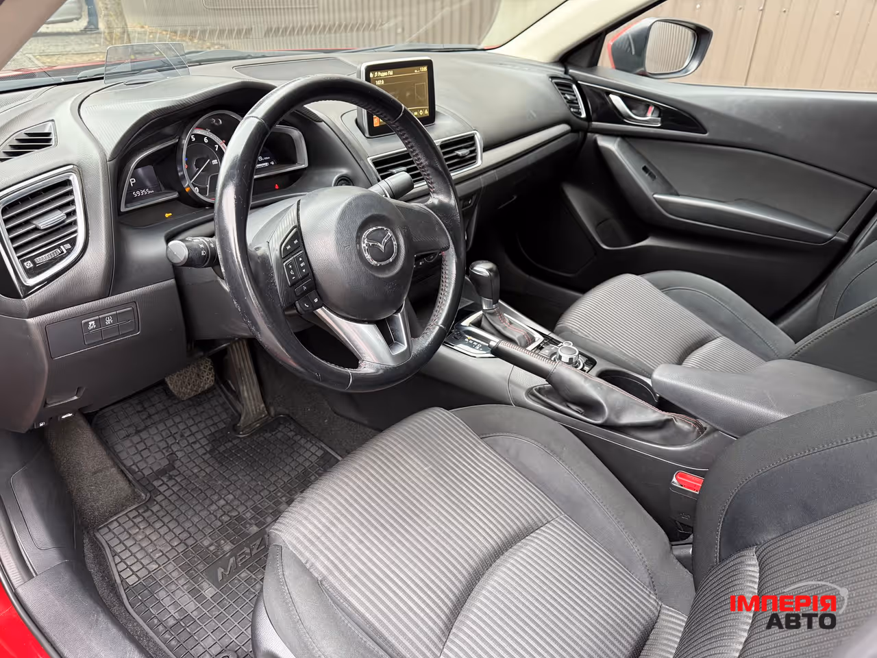 Mazda 3 - фото 9