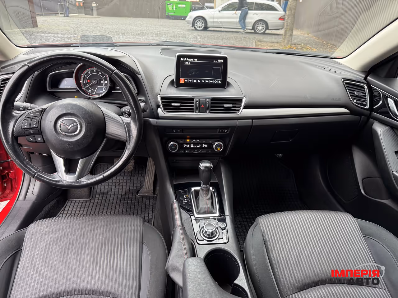 Mazda 3 - фото 12