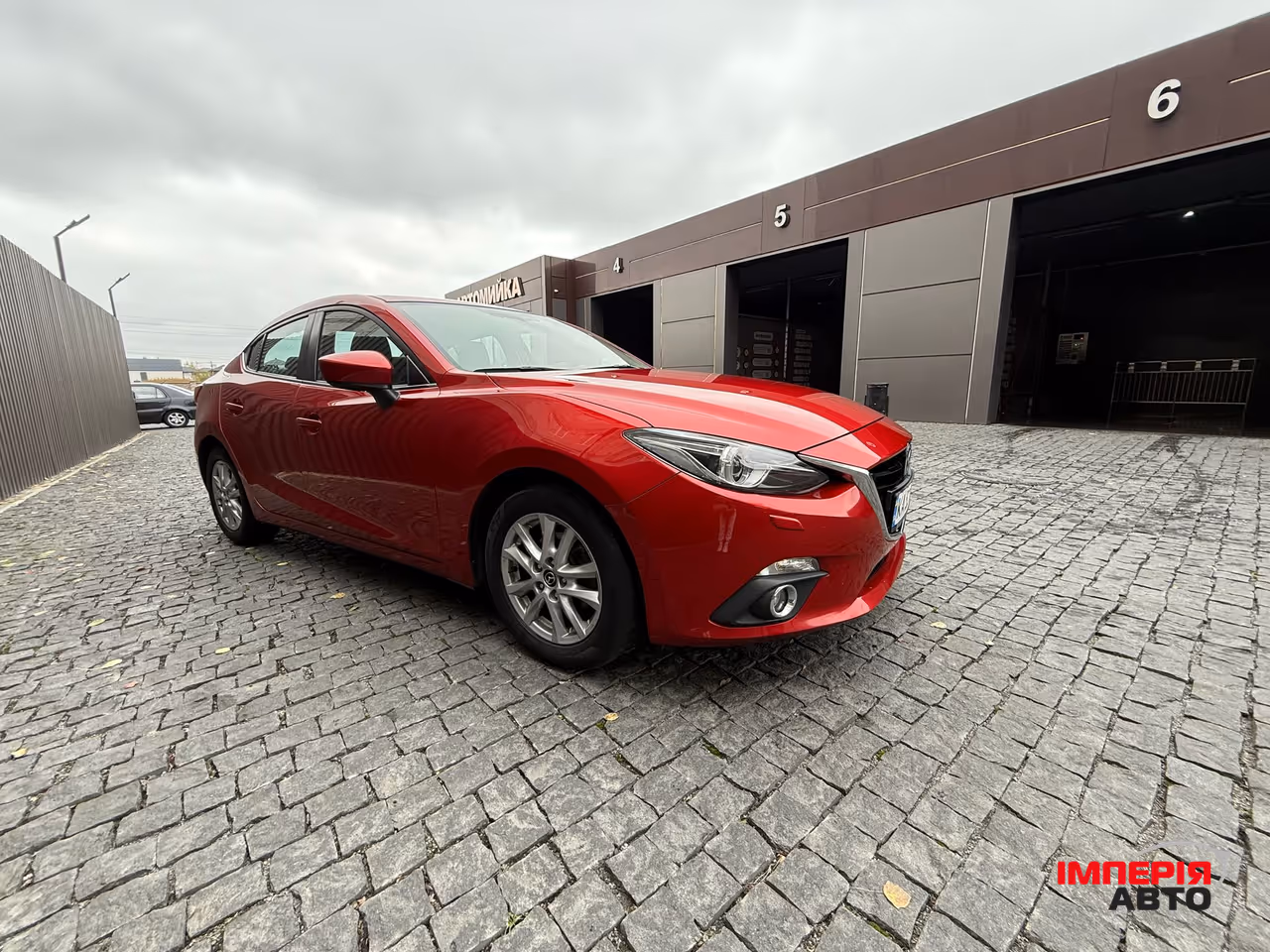 Mazda 3 - фото 7