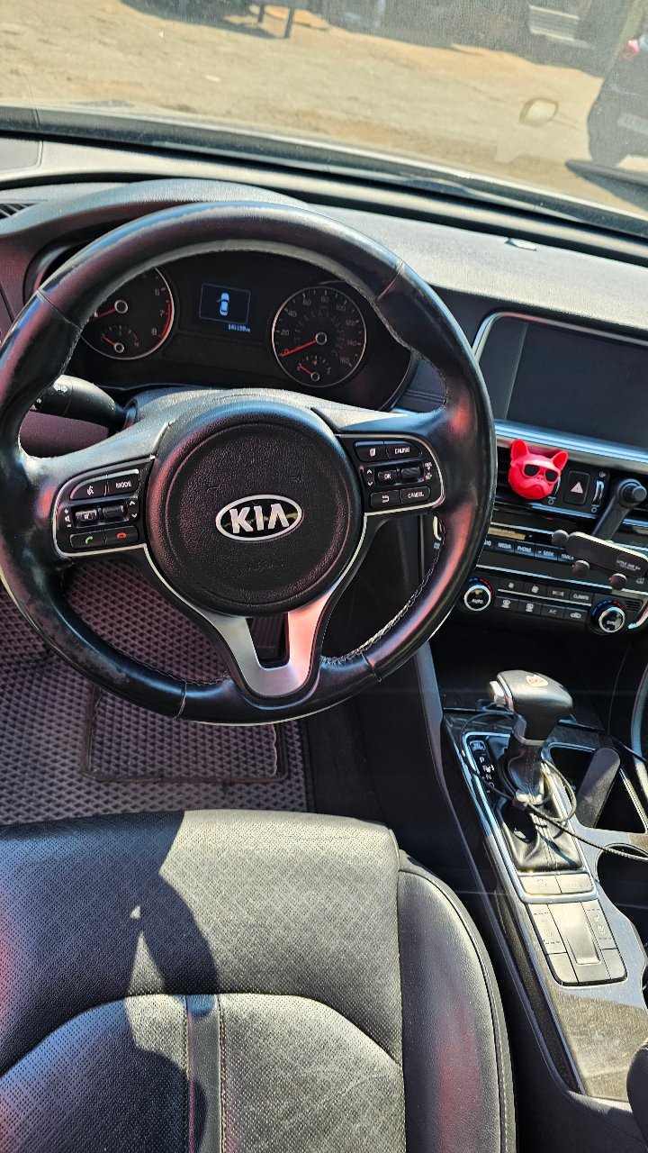 Kia Optima - фото 5
