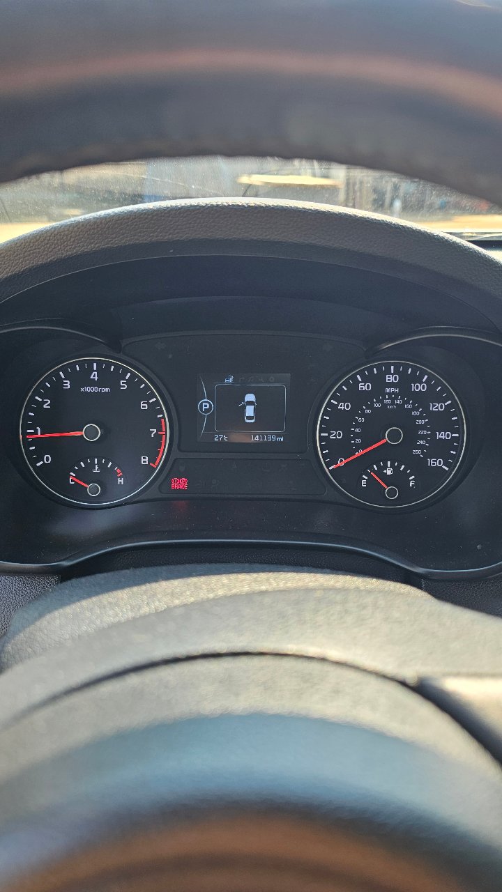 Kia Optima - фото 6