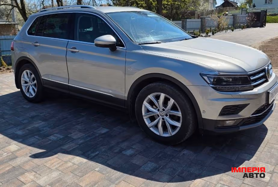 Volkswagen Tiguan - фото 1