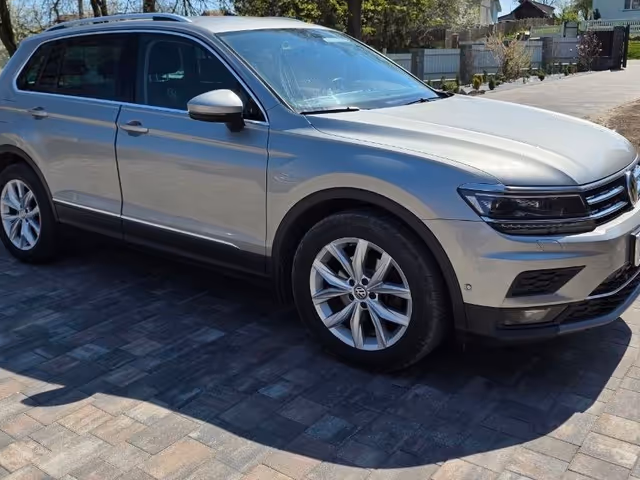 Volkswagen Tiguan - фото 1