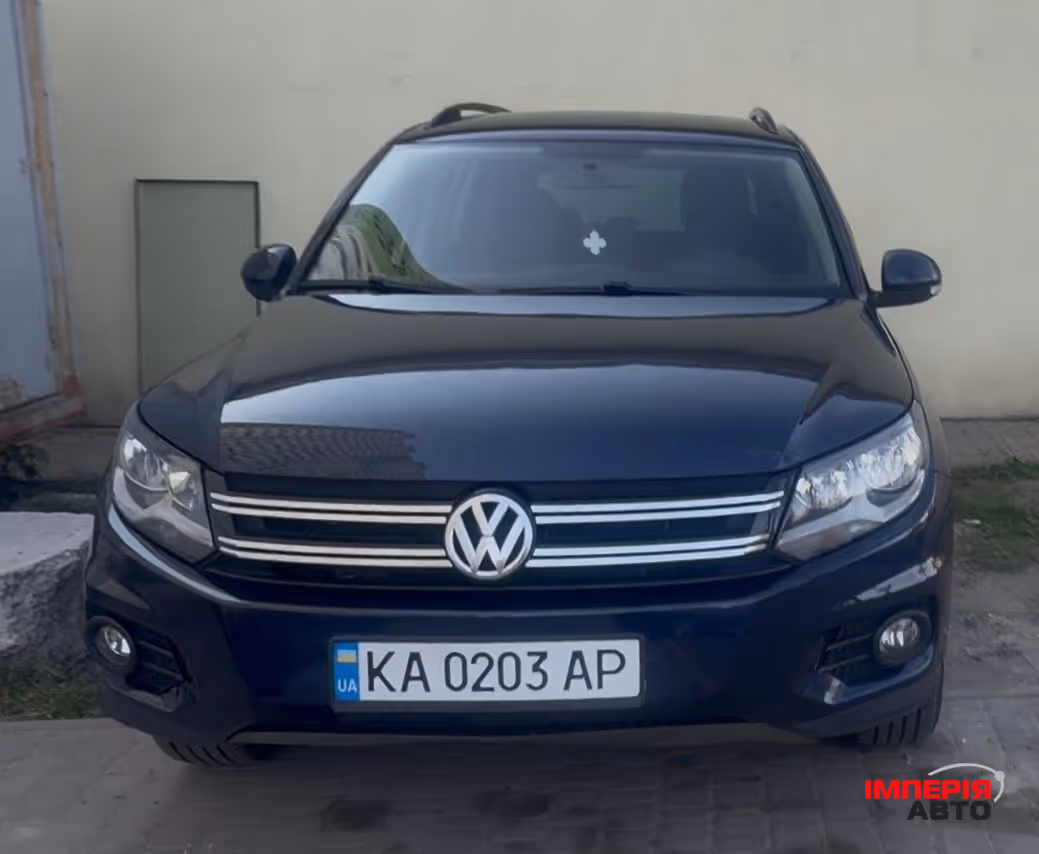 Volkswagen Tiguan - фото 1