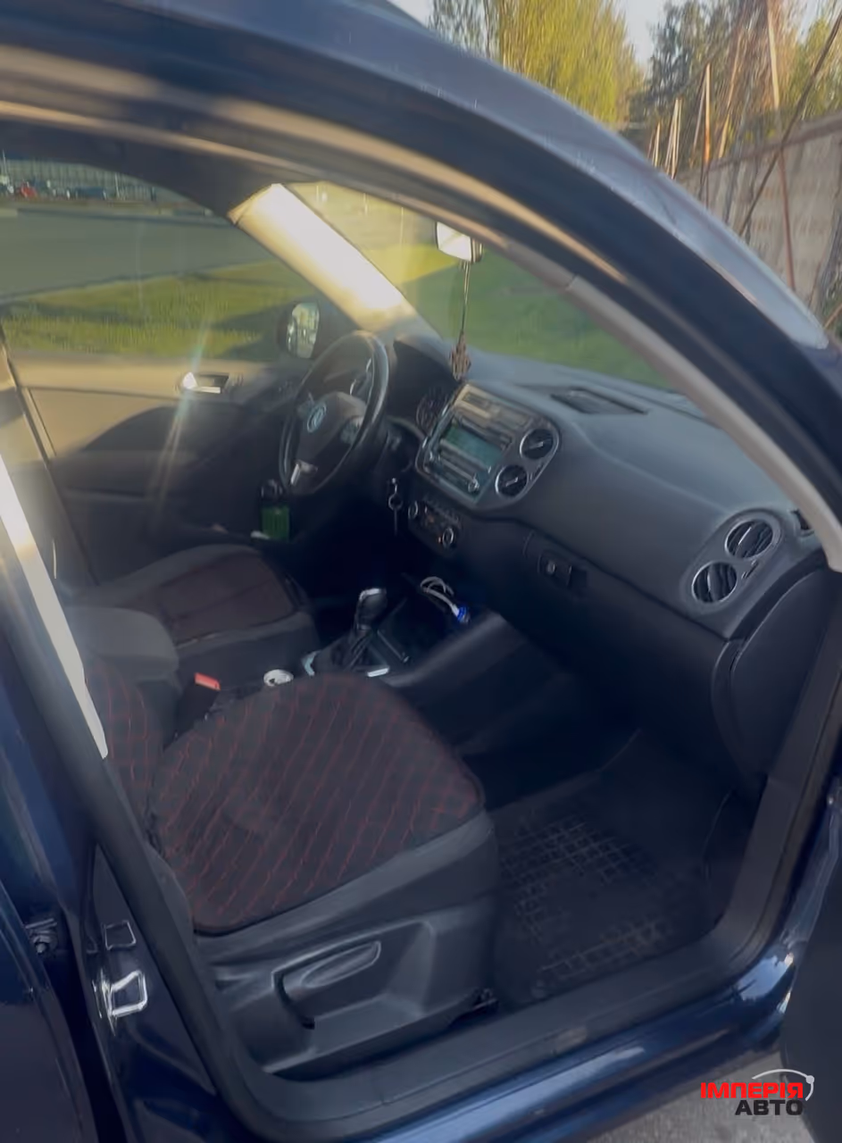 Volkswagen Tiguan - фото 11