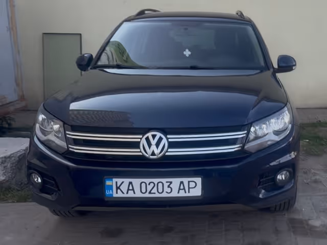 Volkswagen Tiguan - фото 1