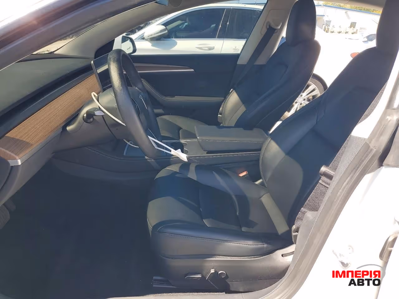 Tesla Model 3 - фото 7