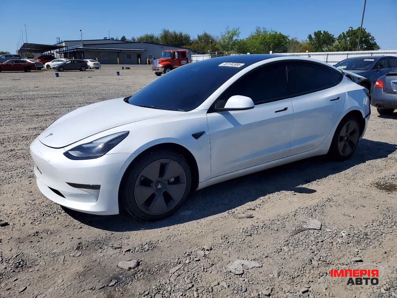 Tesla Model 3 - фото 1