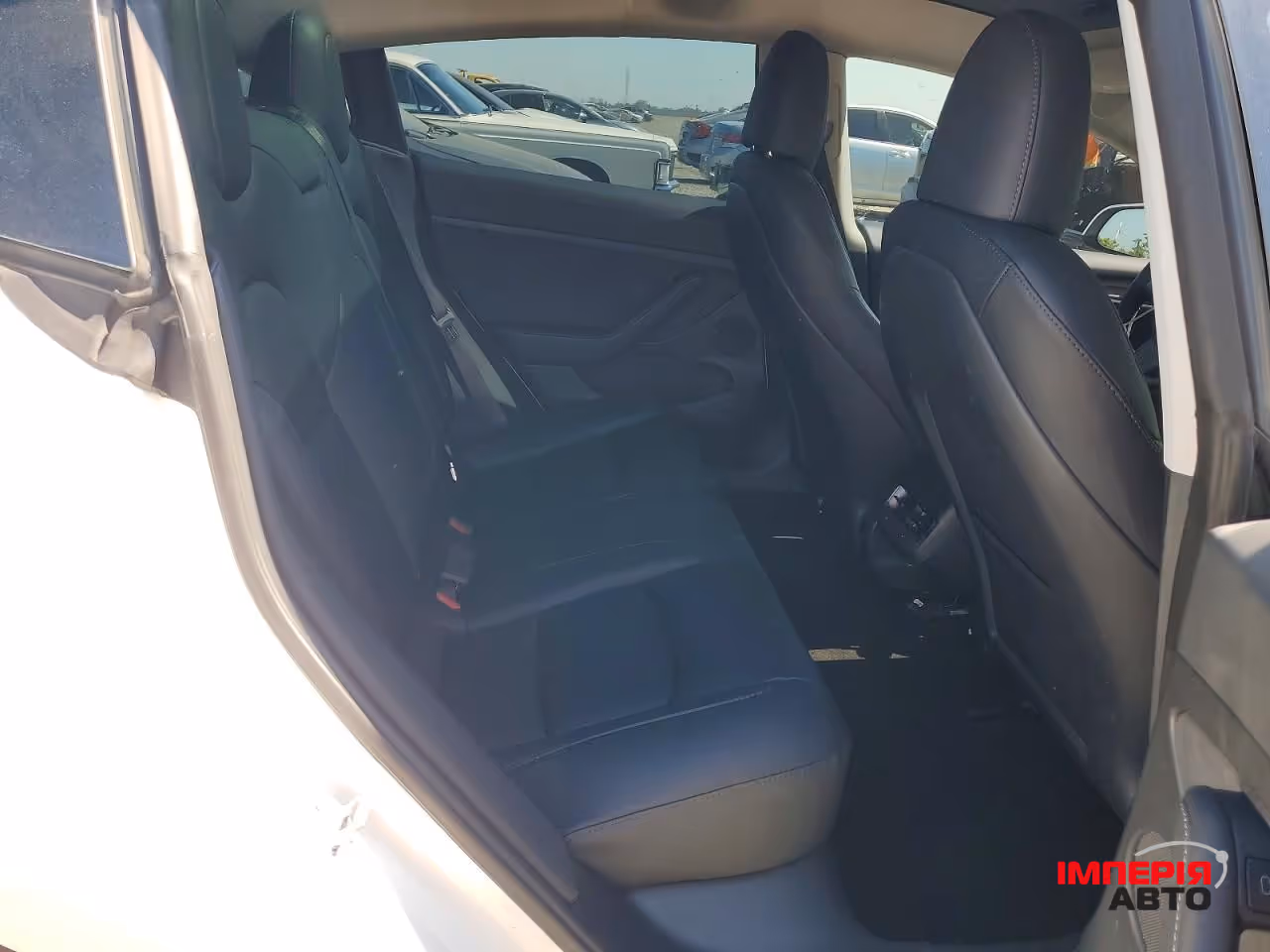 Tesla Model 3 - фото 10