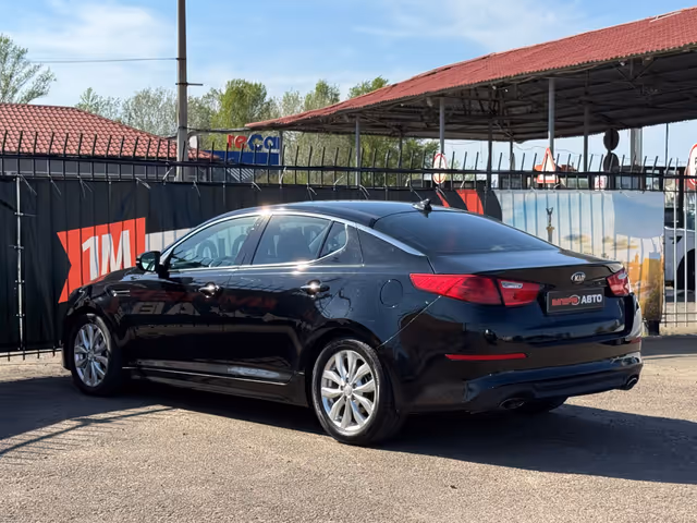 Kia Optima - фото 4