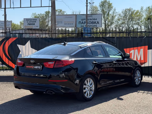 Kia Optima - фото 5