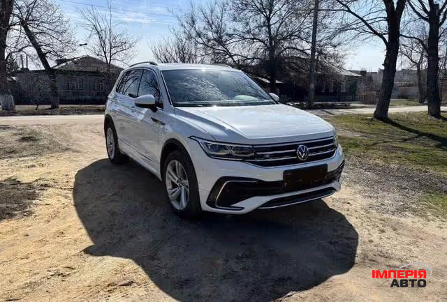 Volkswagen Tiguan - фото 4