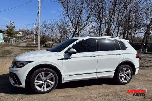 Volkswagen Tiguan - фото 1
