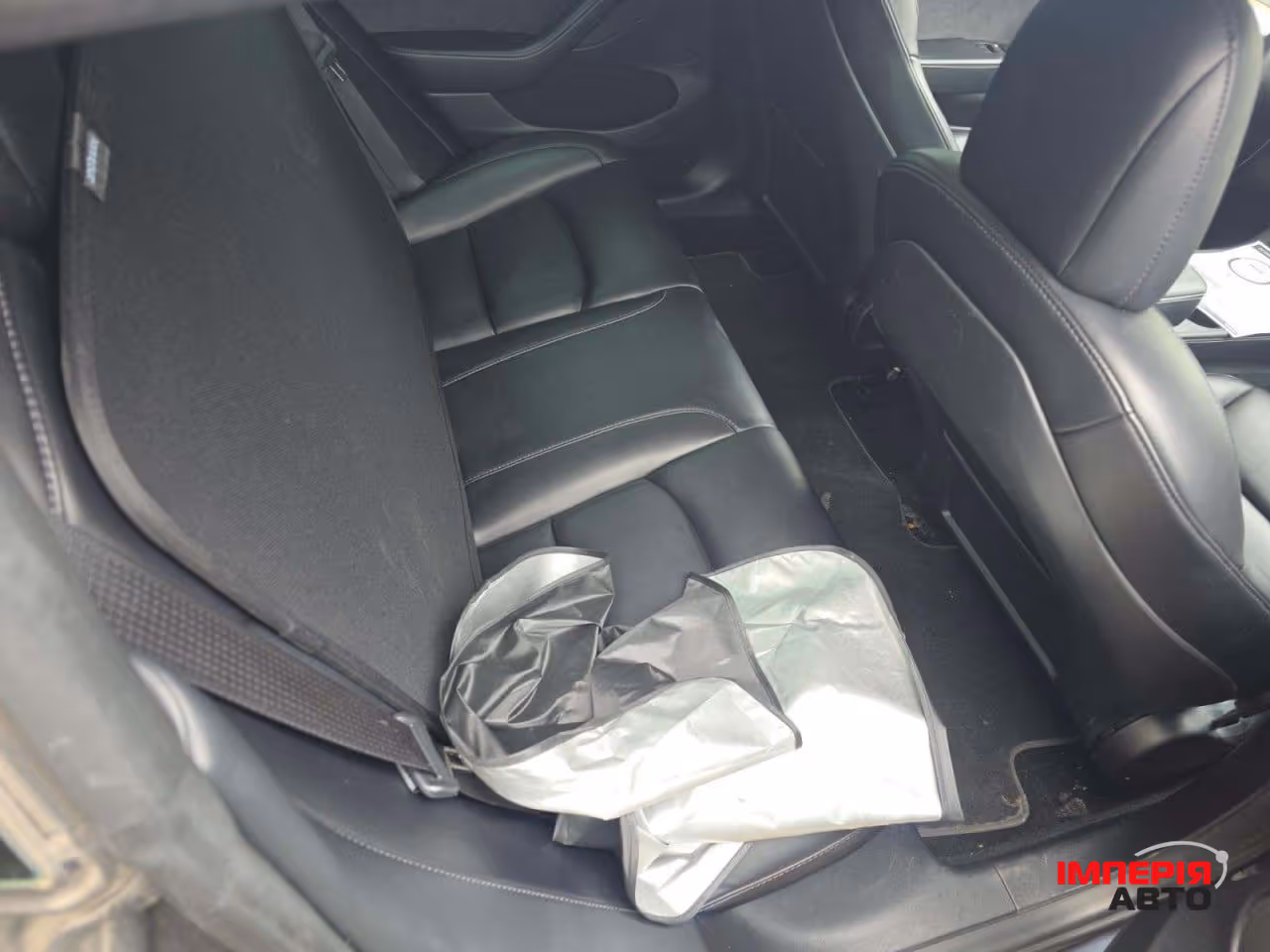 Tesla Model 3 - фото 8